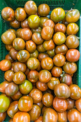 Black tomatoes in Farmers Market, tomato pattern