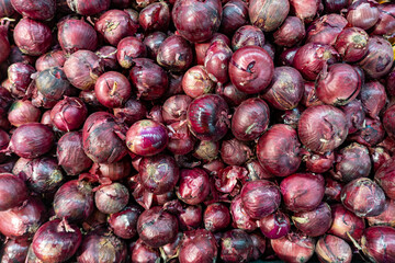 Red onions crop texture, shallot onions in supermarket for use as a mixture of thai food