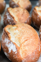 Craft bread on the table at the bakery. The concept of small industries and healthy food