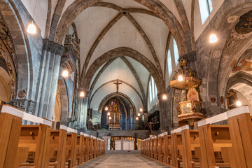 Fototapeta premium Interior of the catholic cathedral in Chur, the oldest town in Switzerland and the capital of the Swiss canton of Graubunden.