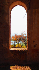 View through a window sill at the ruins of an old missionary church close to Kilifi, Tanzania
