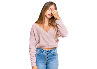 Beautiful blonde woman wearing casual winter pink sweater tired rubbing nose and eyes feeling fatigue and headache. stress and frustration concept.