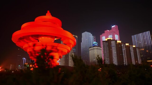 qingdao city downtown front night illumination famous bay monument panorama 4k china