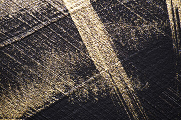 Black background gold lines, texturer art background, hand drawing. Trendy backdrop.
