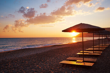Beautiful landscape. Traveling by Turkey. Sea Beach with sunloungers and umbrellas.