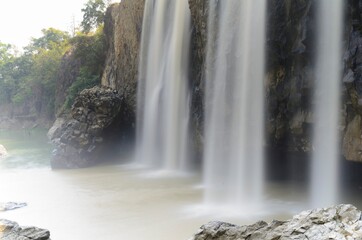 The author took a photo at Bao Dai waterfall tourist area, Lam Dong province, on the morning of...