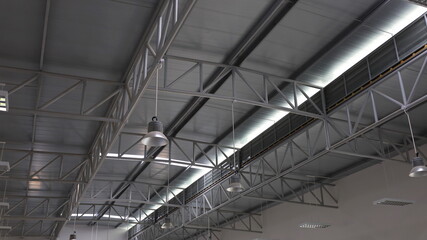 Metal structures and translucent tiles on the roof. Roof element with translucent roof sheet in bottom view with copier area. Selective focus