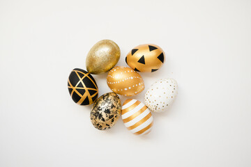Easter golden decorated eggs isolated on white background. Minimal easter concept. Happy Easter...
