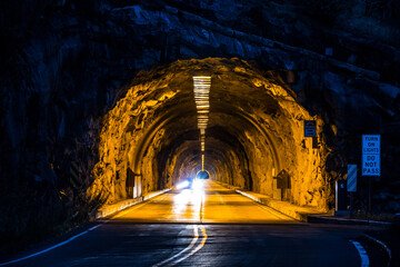 The Wawona tunnel illuminated at night in Yosemite National park in california.