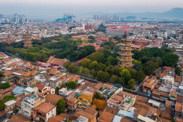 Aerial view of Kaiyuan Temple, the largest buddhist temple in Fujian Province, and West Street at dusk in Quanzhou, China