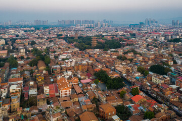 Aerial view of Kaiyuan Temple, the largest buddhist temple in Fujian Province, and West Street at dusk in Quanzhou, China