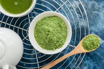 Composition with powdered matcha tea on color background