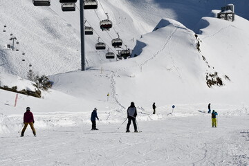 Beautiful snow landscape of snowy trees and ski slope of Roza Khutor ski resort © Belov Andrey