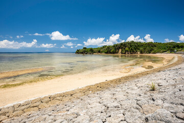 View to Sonai beach with blue sea and low tide. Place to relax and contemplation. Iriomote Island.