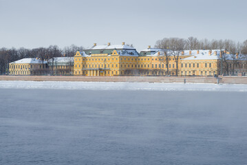 Fototapeta na wymiar View of the old Menshikov Palace (the palace of the first governor of St. Petersburg) on a cloudy February day. Saint-Petersburg, Russia