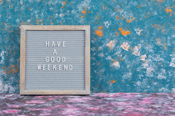 Have a good weekend poster on blue background