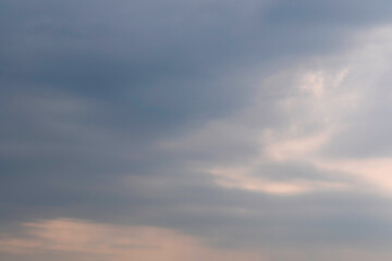 White cloud flying on blue sky with warm color sunlight as texture and background