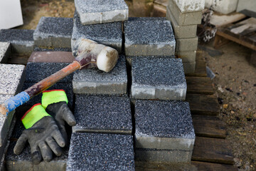 Work on laying concrete paving stones