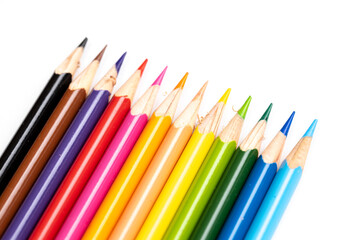 Colored pencils background. Color pencils on white background.