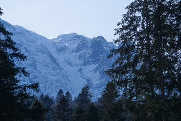 Mountain landscape in Bucegi National Park, Romania. Snowy mountain ridges.