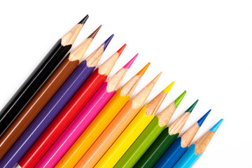 Colored pencils background. Color pencils on white background.