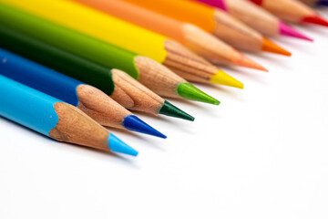 Fototapeta premium Colored pencils background. Color pencils on white background.