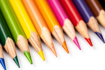 Colored pencils background. Color pencils on white background.