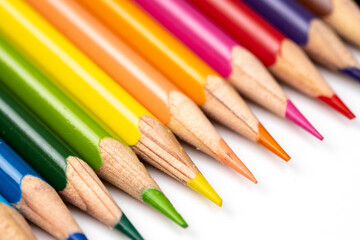 Colored pencils background. Color pencils on white background.