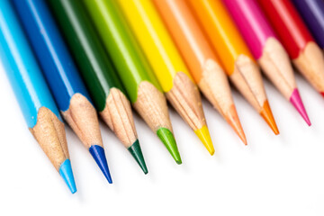 Colored pencils background. Color pencils on white background.