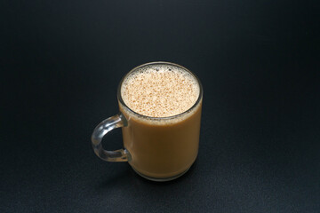 Milk tea or popularly known as The Tarik in Malaysia, in the cup, hots and ready to drink.