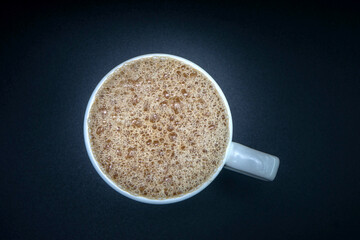 Milk tea or popularly known as The Tarik in Malaysia, in the cup, hots and ready to drink.