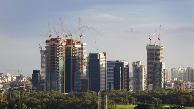Skyscraper Construction Sites In 
Ramat Gan And Tel Aviv , Day To Night Time lapse