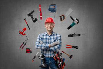 happy worker handyman ( Jack of all trades ) or builder with construction tools