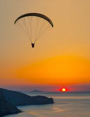 paraglider pilot fly in sky on beauty nature mountain and sea landscape