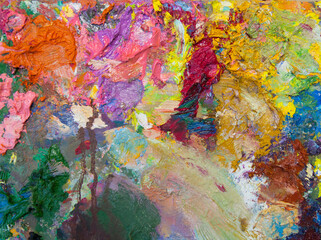 Artist palette with paint. Abstract bright color background with texture.