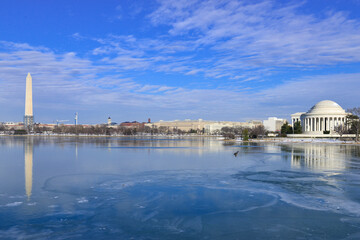 Washington D.C. in winter - Jefferson Memorial and Washington Monument as seen from Tidal Basin -...