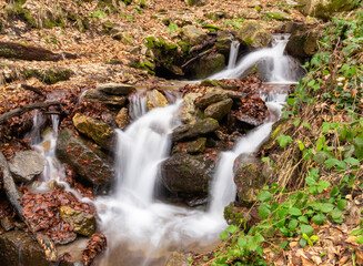 The waterfall was photographed with a short exposure time, creating an unreal, dreamy landscape