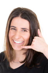 Woman doing phone gesture call me back with hand and fingers like talking on phone isolated on...