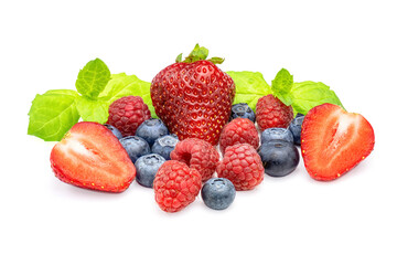 Mixed sweet fresh berries on white background. Ripe strawberry, raspberry, blueberry and mint leaves.