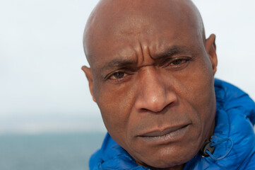 middle-aged black man looking into the camera