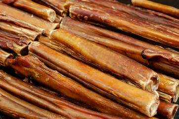 Bully sticks for dogs. Close-up of dried chew pet treats.
