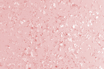 pearl confetti sparkles on pink holiday background. Festive backdrop of sparkles for birthday,...