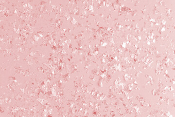 pearl confetti sparkles on pink holiday background. Festive backdrop of sparkles for birthday, carnival