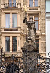Fototapeta na wymiar Fountain Neptune on E. Benes Square, Liberec, Czech Republic