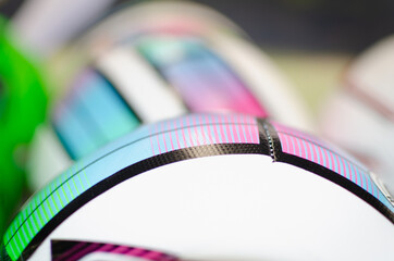 Colored soccer ball with blurred background.