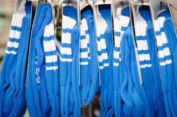 Blue-white sports socks in packs.