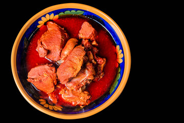 Dish of cochinita pibil, in a typical Mexican dish
