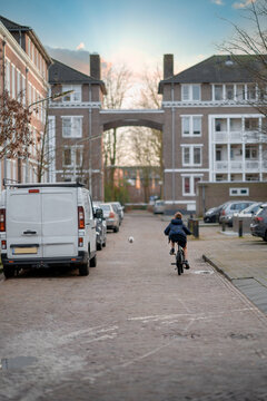 boy playing with his bike and a soccer ball