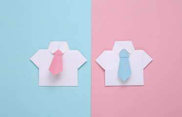 Origami shirts with ties on a blue-pink pastel background. Leadership, teamwork, business concept