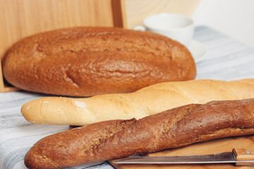 bread on a wooden table kitchen knife baking breakfast